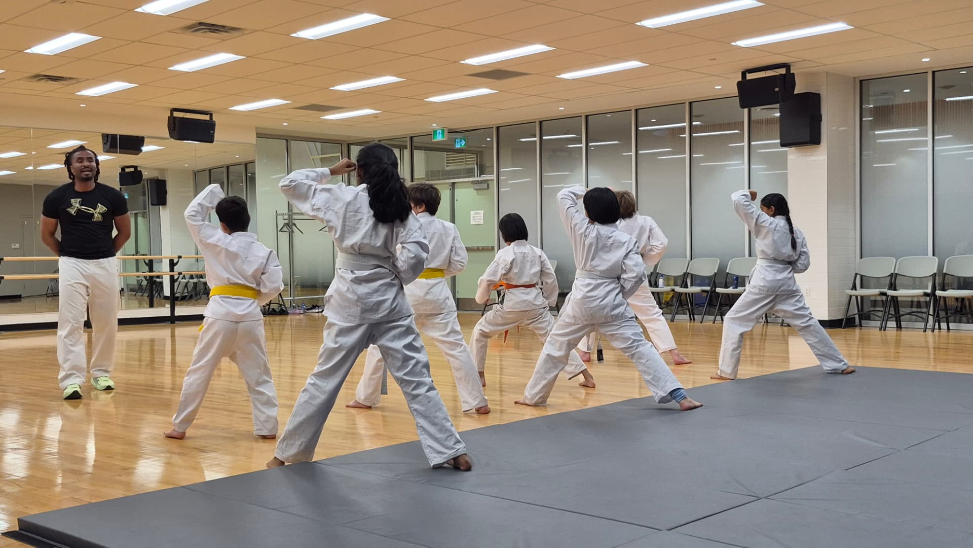 Children focused during a karate lesson